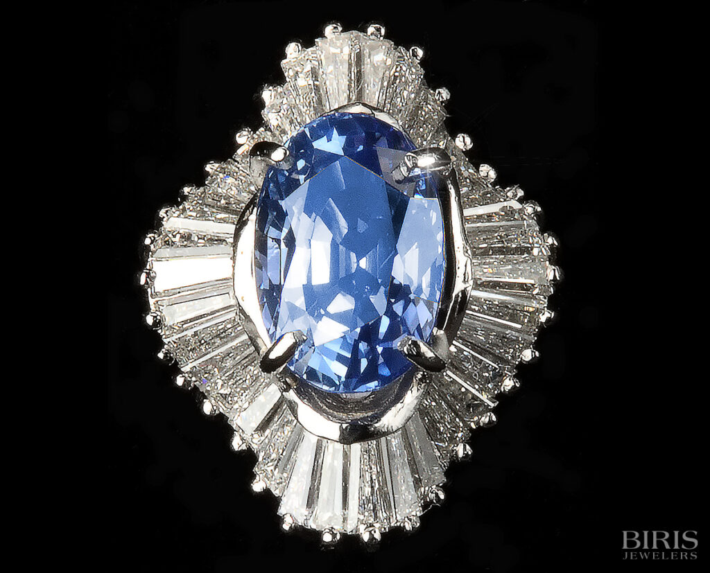Platinum diamond and sapphire , ballerina style ring