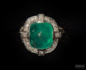 Cabochon emerald and diamond ring , platinum